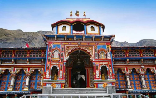 Badrinath temple against mountain backdrop